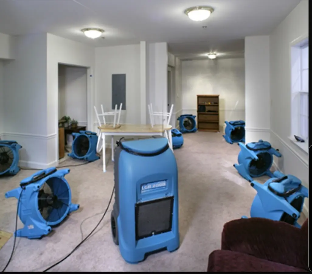 Air movers and dehumidifier setup for Water Extraction & Removal in Grants
